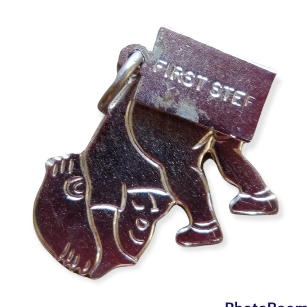 Vintage STERLING baby's first step pendant/charm